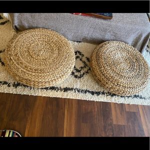Two rattan basket style floor chair stools